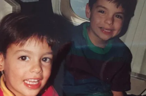 Andy and brother in plane.